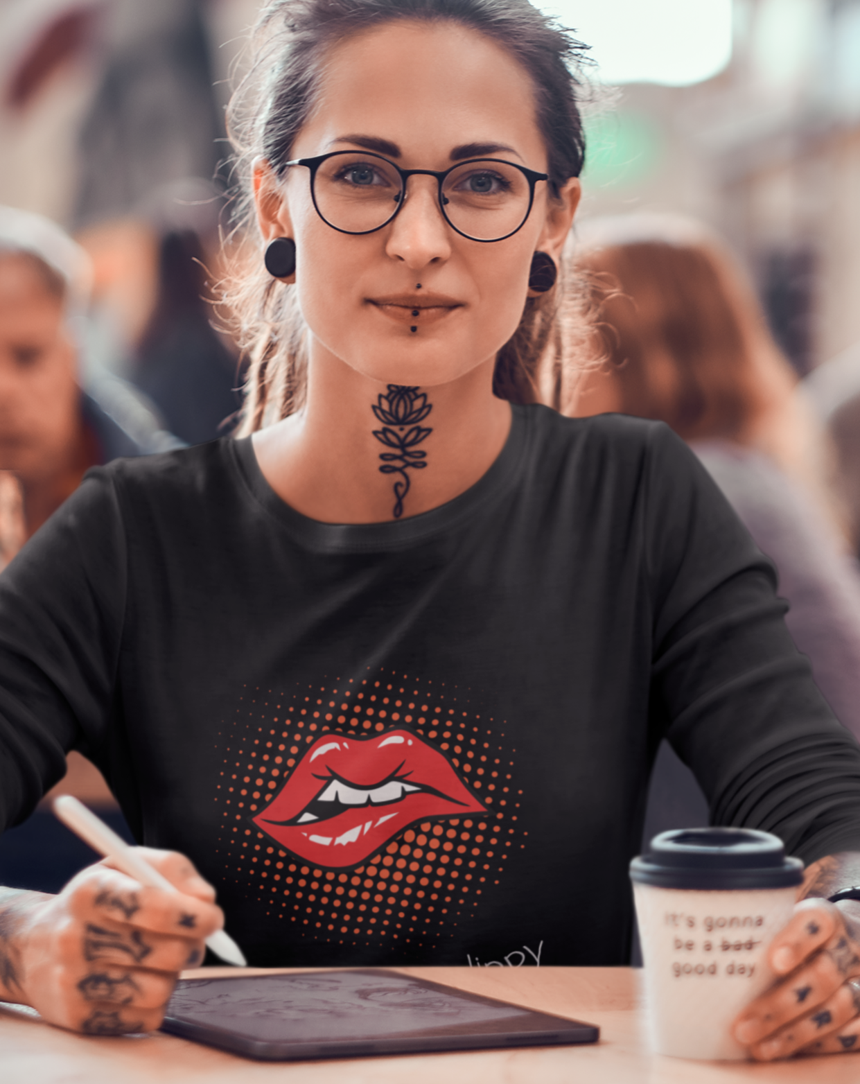 70s inspired lips long sleeved t-shirt with "feeling lippy" slogan. Small through to 2XL
