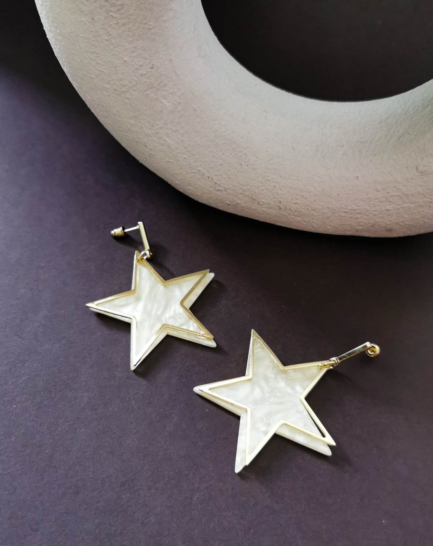 Gold tone star earrings