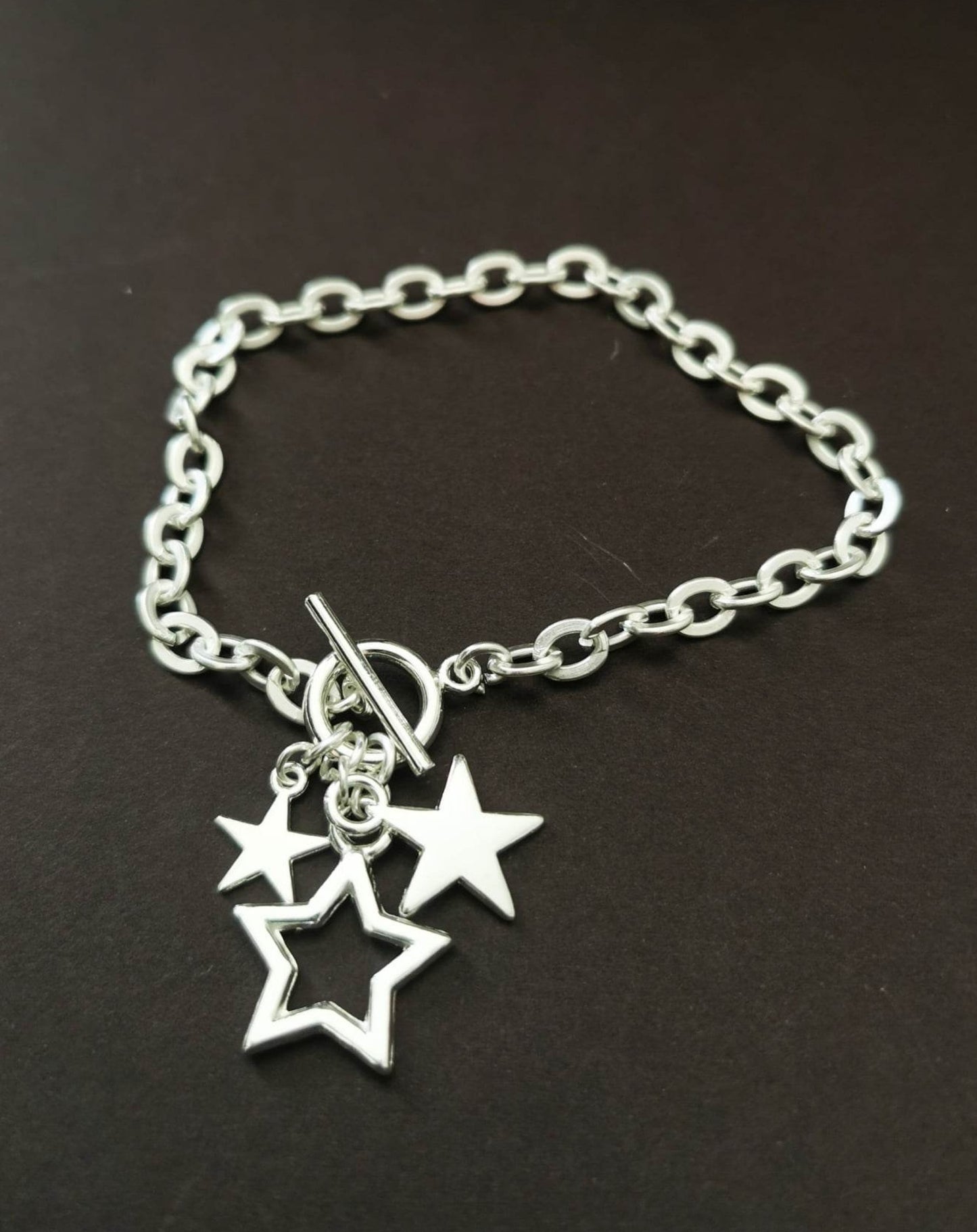 Silver plated star bracelet with toggle fastening