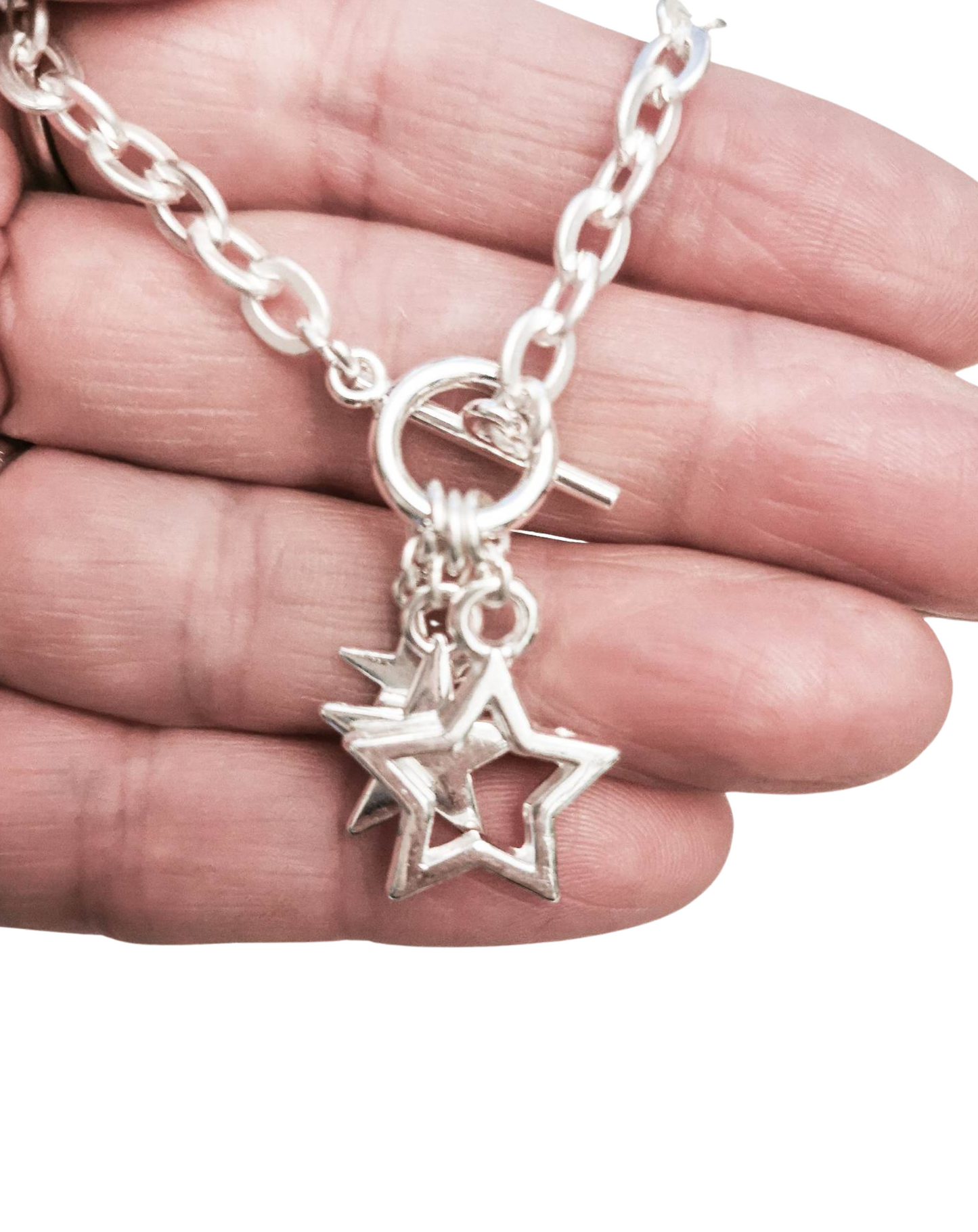 Silver plated star necklace with toggle fastening