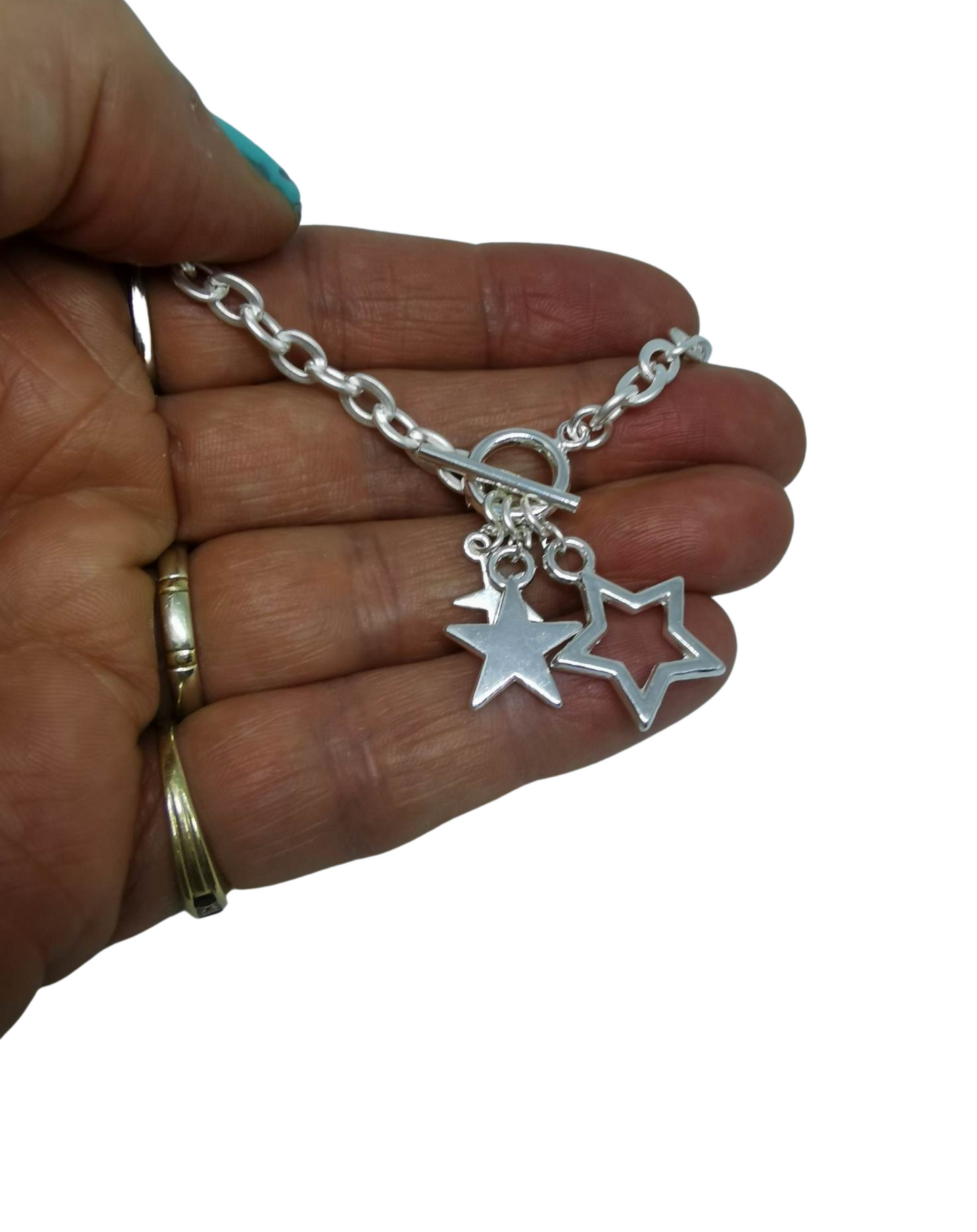 Silver plated star bracelet with toggle fastening