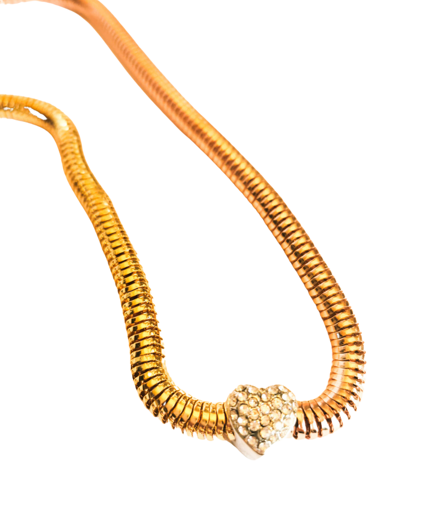 Gold tone necklace with crystal heart detail