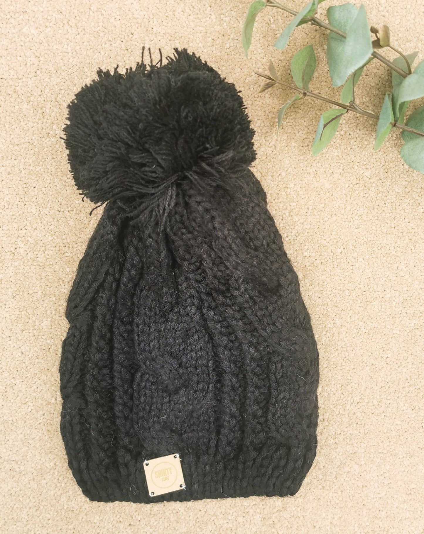 Black chunky knit bobble hat