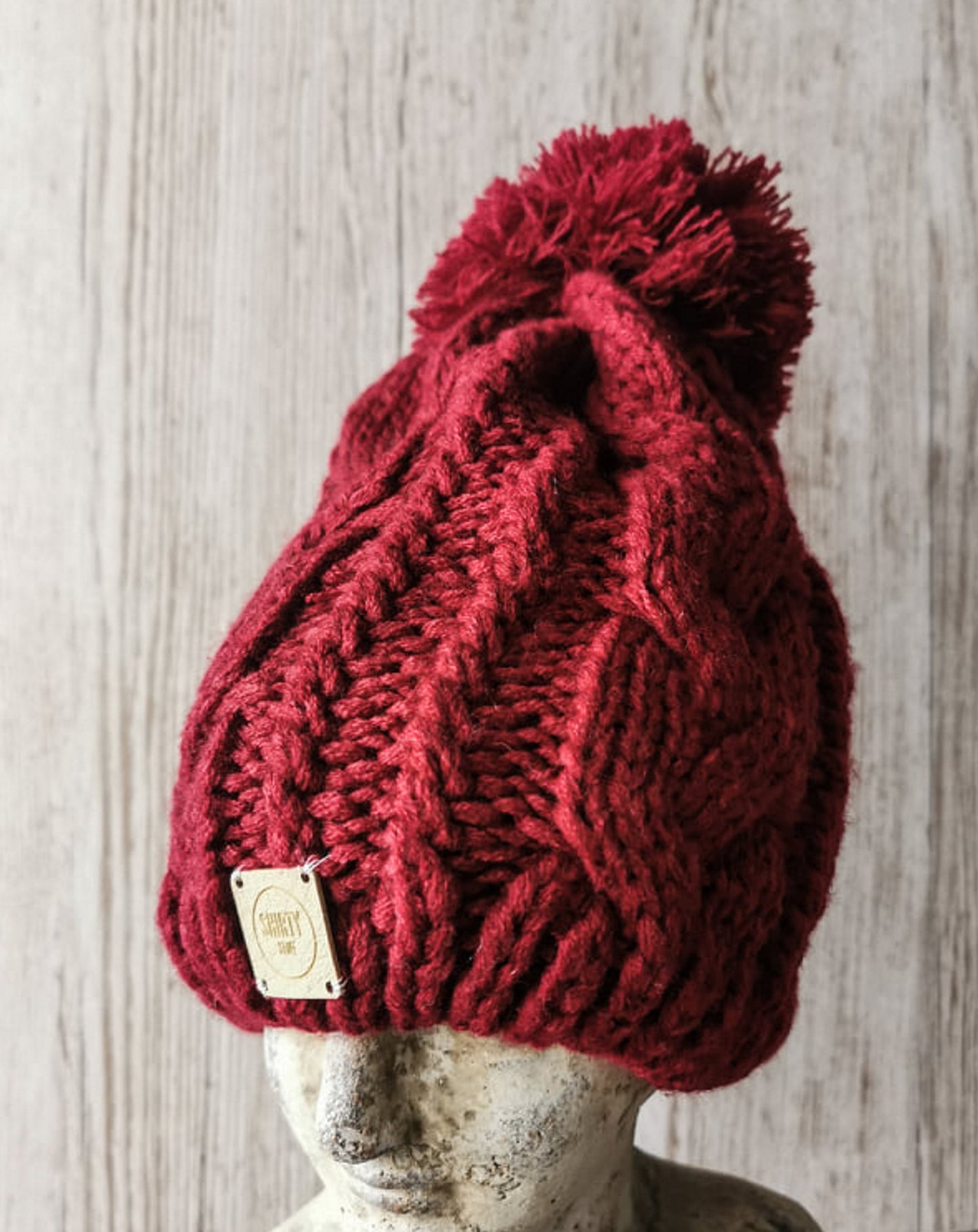 Red chunky knit bobble hat