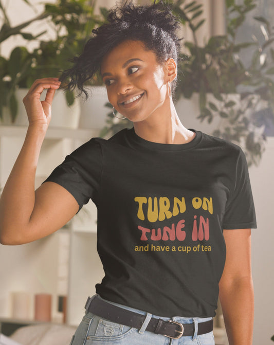 70s inspired Turn On, Tune In and have a cup of tea t-shirt.  Great gift for tea lover.  Small through to 3XL.